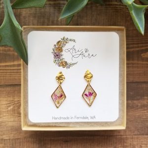 These pink dried wildflower dangle earrings are one-of-a-kind and express the beauty of nature and the memory of a blooming flower.