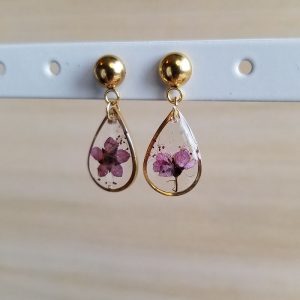 These minimalist dried flower earrings feature real pressed spirea bush flowers in a small gold teardrop setting.