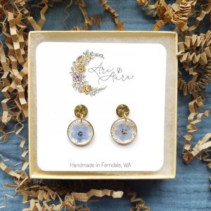 A splash of glitter and something blue, these forget me not resin dangle earrings make the perfect bridesmaid gift.