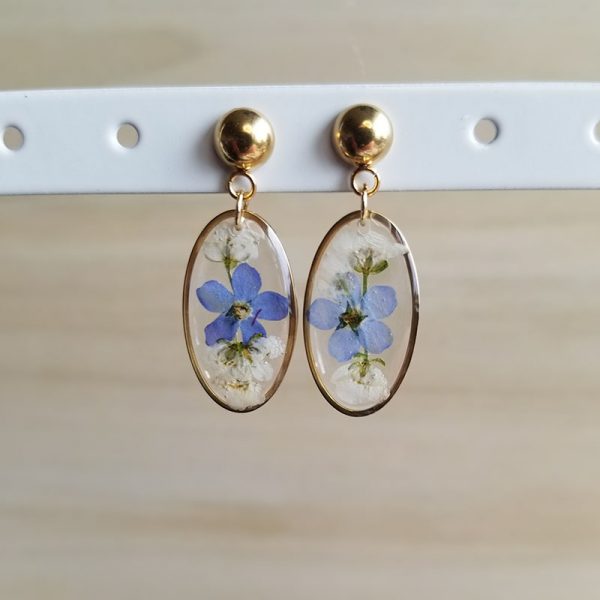 Real pressed forget me not flowers representing true love make these earrings the perfect bridal shower gift.