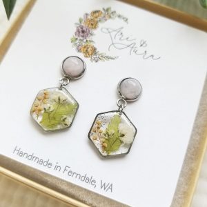 Add a touch of nature to your wardrobe with these beautifully crafted rose quarts dried flower dangle earrings.