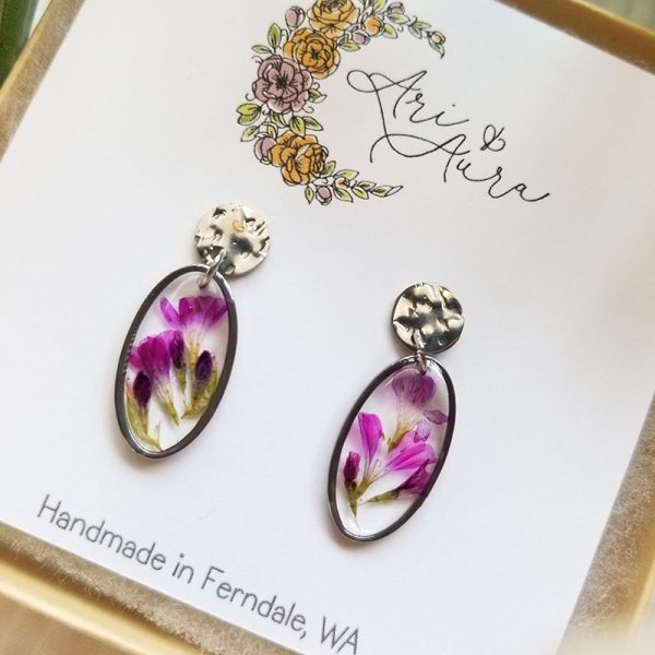 These bright pink flower petal earrings will add a uniquely vibrant pop of color to your outfit!