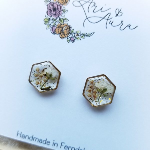 Add a touch of whimsy to your accessory collection with these dried Alyssum flower earring studs.